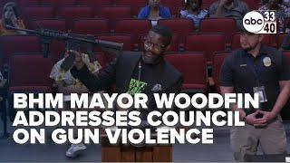 "It's a public health crisis." Mayor Woodfin presents AR-15 at Birmingham city council