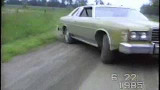 1976 Ford LTD on a gravel backroad