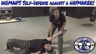 WOMAN'S Self - Defense against a haymaker | Combative Concepts