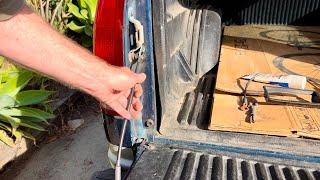 How To Replace The Tailgate Cables On A Chevrolet Pickup Truck