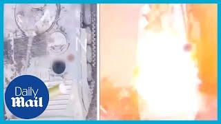 Bullseye! Moment Ukraine drone drops grenade into open Russian tank hatch