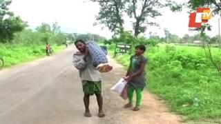 Man carries wife' in Odisha's Kalahandi district helplessly