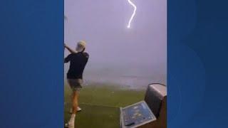 Lightning strike hits golf ball in mid-air