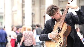 Performer Tom Ward Broken Guitar Great Gate of Kiev Mussorgsky - Live Street Performers