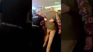 Moment Tyson Fury escorted from pub by Britain’s bravest bouncers before collapsing outside