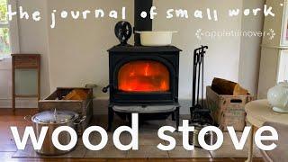 save energy with a wood stove by stacking functions: off-grid cookery, drying, laundry, biochar…