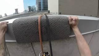 Rope access window cleaning with rigging