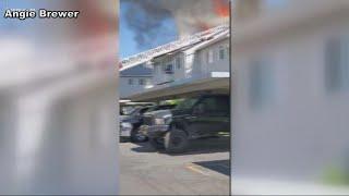 Crews work to put out Spokane Valley apartment complex fire