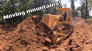 Pushing dirt with an International Dresser TD25G bulldozer better than a CAT or John Deere?