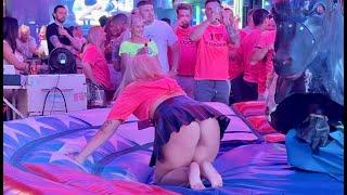 Blonde Girl in Pink Clothes Ride on Mechanical Bull in Benidorm | Bull Riding 4K