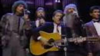 Paul Simon & The Oak Ridge Boys - "Slip Slidin' Away"