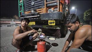 Truck Drivers Cooking on Road