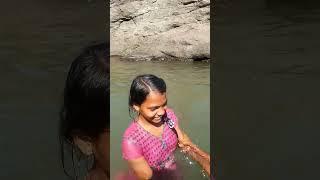 village girl bathing outdoor