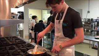 Teen chef Aidan Forgey, a junior at Decatur High School, demonstrates his culinary skills