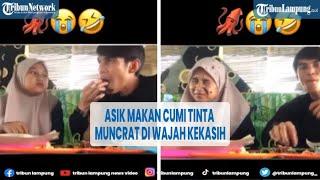 Viral Asik Makan Cumi Tinta Hitamnya Muncrat di Wajah Kekasih @TRIBUNLAMPUNGNEWSVIDEO