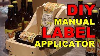 LABEL APPLICATOR   FOR BEER BOTTLES