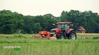 Gras mähen mit Case Puma 180 und Kuhn [HD]