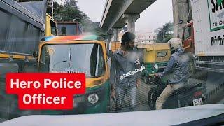 On duty police teach a lesson to an auto driver