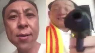 Angry Chinese Man Yells At Another Chinese Man With A Gun