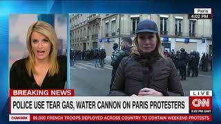Breaking news: Paris riots as police use tear gas and water cannons