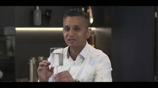 Milin Patel - water sommelier tastes some of the unique water recipes from LUQEL