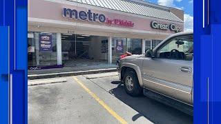 Pickup truck crashes into cellphone store on Northwest Side