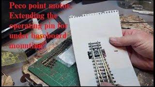 Peco point motor - Extending the operating pin for under-baseboard mounting.