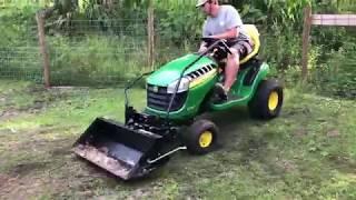 Little dirt moving with the John Deere e140 tractor scoop