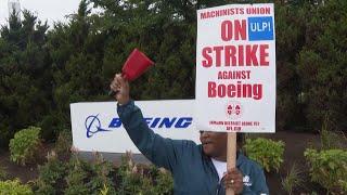 Boeing works to conserve cash as 33,000 factory workers go on strike, AP Explains