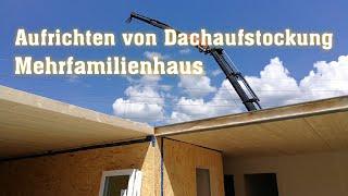 Aufrichten von Dachaufstockung MFH | Holzbau