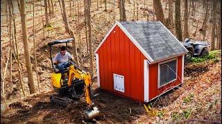 Moving a chicken coop Airbnb down a steep hill