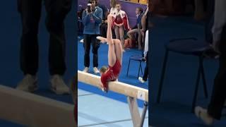 Watch the Mastery on Beam – Flawless Execution and Style