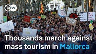Why are Mallorca residents protesting against tourists? | DW News