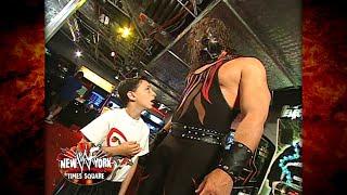 Kane Helps A Kid Win A Prize At WWF New York! 6/18/01