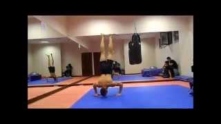 Handstand Clap Push Ups x 10 - Berk Cavusoglu