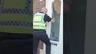 Police SMASH front door to arrest riot suspect