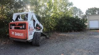 Brush mowing and clearing in Smyrna, GA. Bobcat service in greater Atlanta.