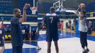 Kevin Durant helps Anthony Edwards with his shot at Team USA practice before Olympics