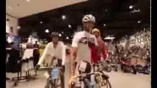 flash mob bicycle race inside go sport shop