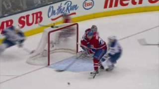 Alex Auld save, Blocker on John Mitchell shot, Wrist, Off. Zone, 24 ft (2010-12-11)