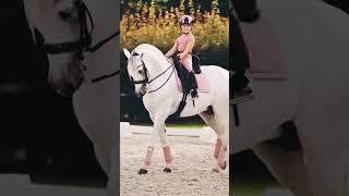 Amazing ride of mother and daughter on white horses.