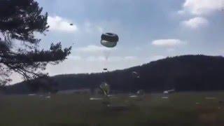 U.S. Army: Humvees falling to the ground in airdrop exercise.