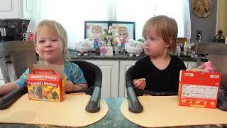 Twins try animal crackers in the box