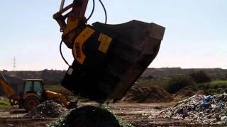 MB crusher bucket crushing bottles of glasses - www.mbcrusher.com