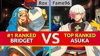 GGST ▰ Rox (#1 Ranked Bridget) vs Fame96 (TOP Ranked Asuka). High Level Gameplay