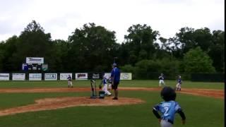 Sean Huggins (Pitcher) catches a fly ball hit