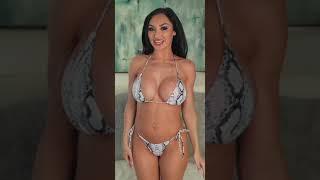 Sexy brunette with big boobs trying on 5 types of micro swimsuits 