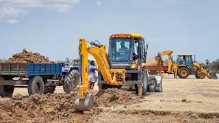 Mahindra and JCB 3dx Machine Loading Mud in Powertrac Mahindra Sonalika Swaraj Tractor for Road work