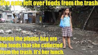 A Poor Filipino Child Looking for Food in the TRASH. Filipino Family Living in Extreme Poverty