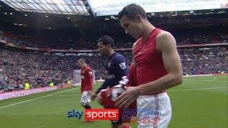 Robin van Persie & Andre Santos swap shirts at half-time